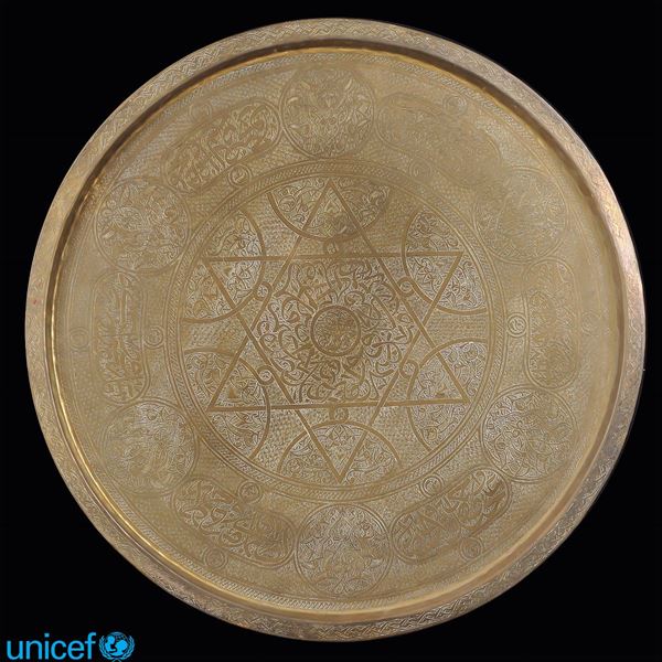 Large tray engraved in golden metal