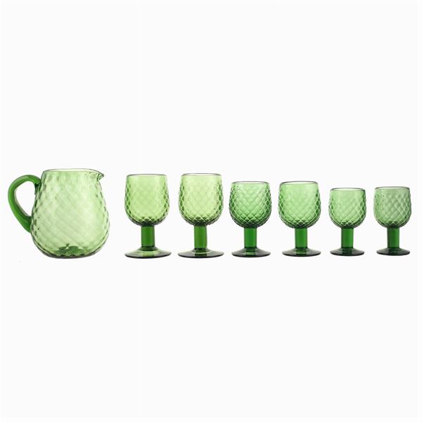 A green glass calice service