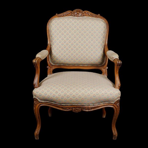 An inlaid walnut armchair