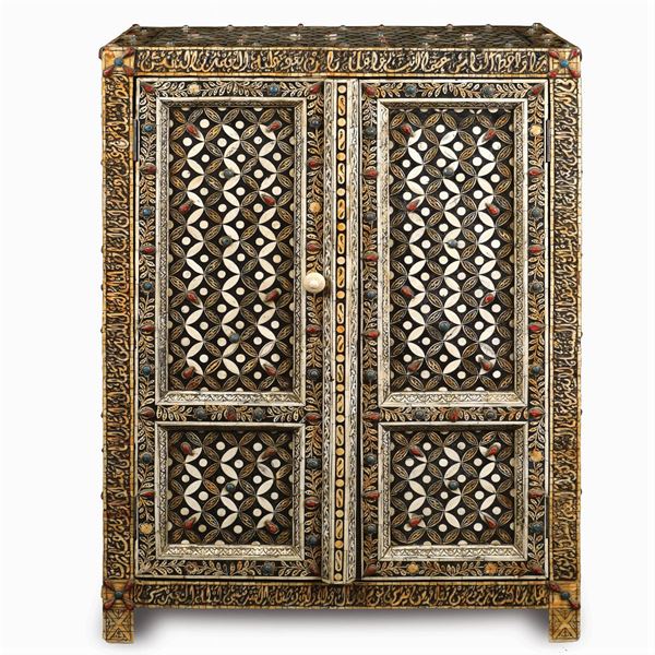 An ebonized wooden sideboard