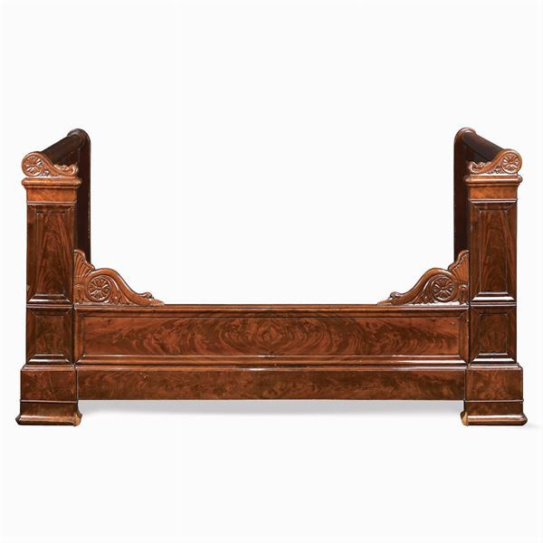 A mahogany Impero style bed