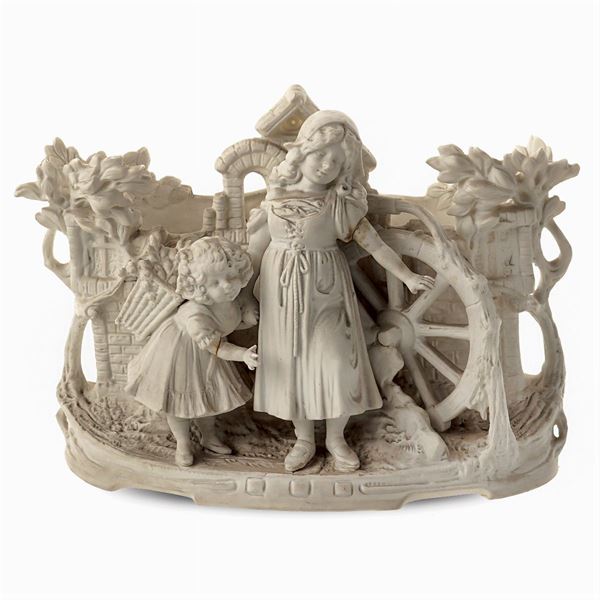 A biscuit porcelain centerpiece pot