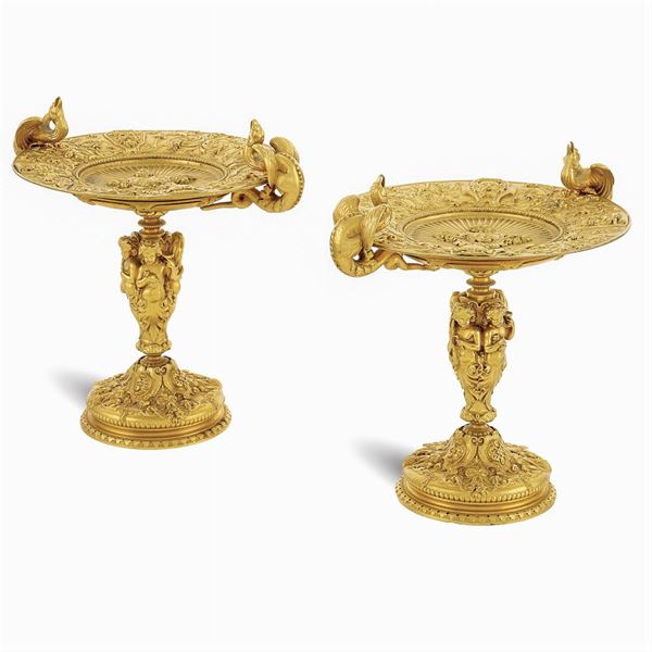 A pair of gilt bronze stands