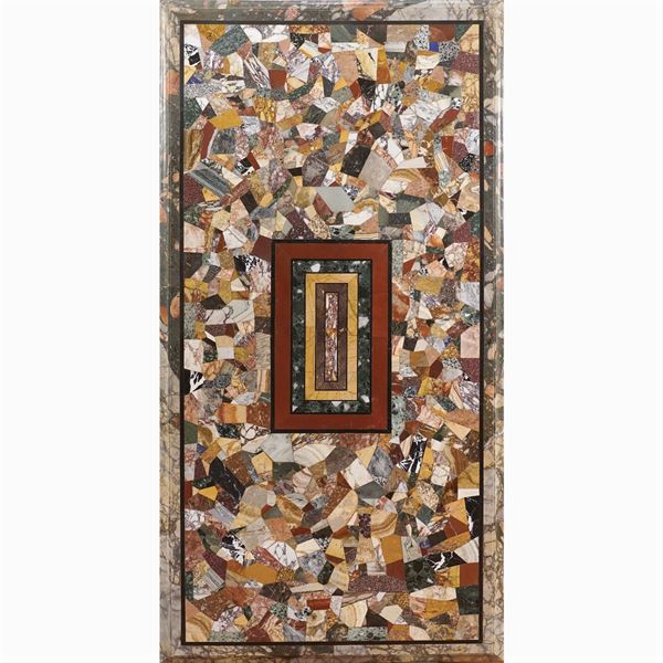 A rectangular table in polychrome marbles