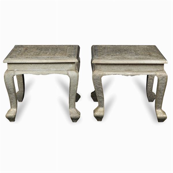 A pair of wooden tables