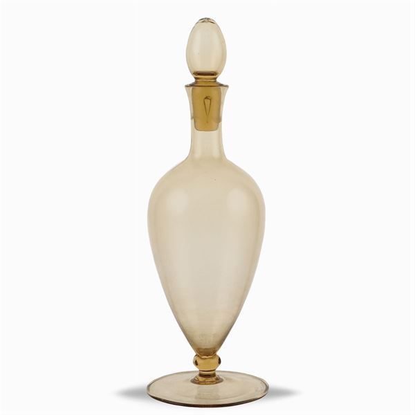 A blown glass bottle