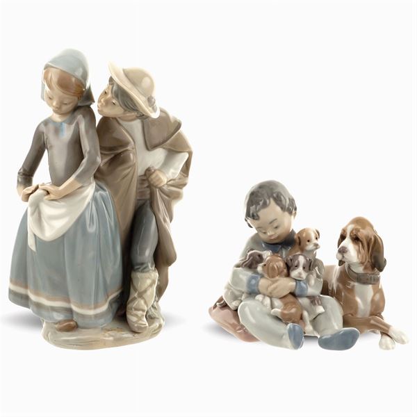 Coppia di figure in porcellana