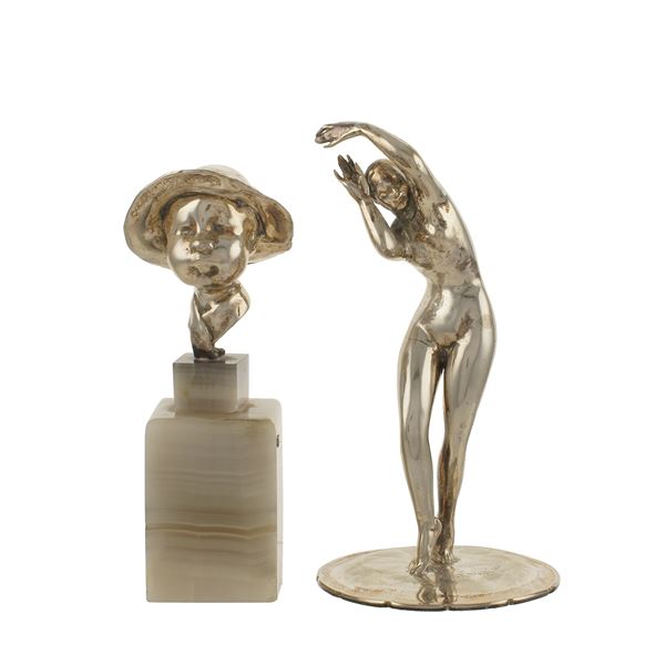 Two silver sculptures