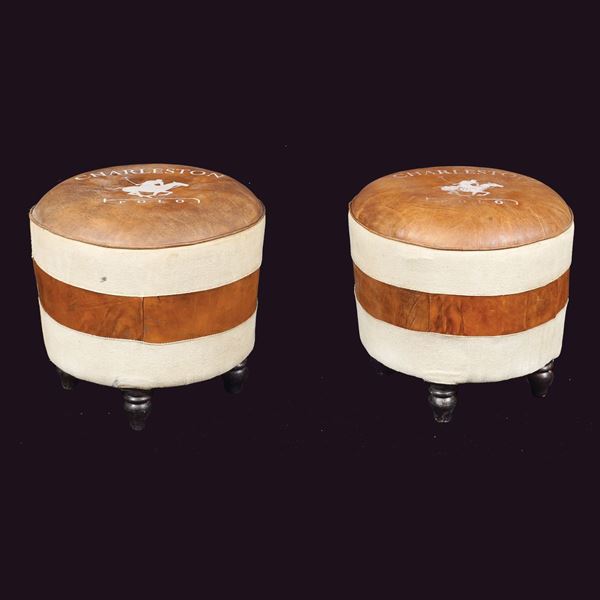A pair of polo stools in leather and fabric