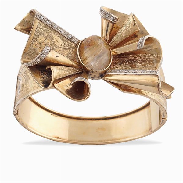 Bracciale fiocco a manetta in oro rosa 9kt