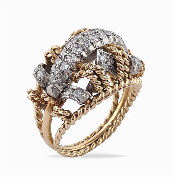 A rose and white gold ring