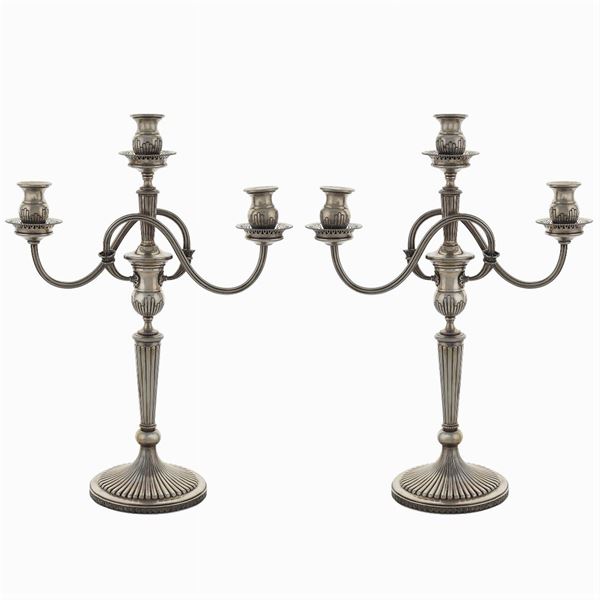 Pair of silver chandeliers