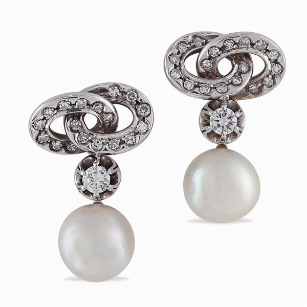 Orecchini a lobo in oro bianco 18kt