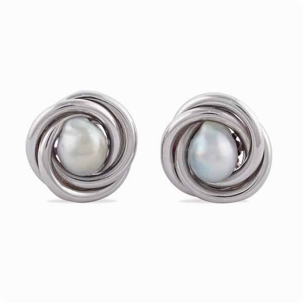 Orecchini a lobo in oro bianco 18kt