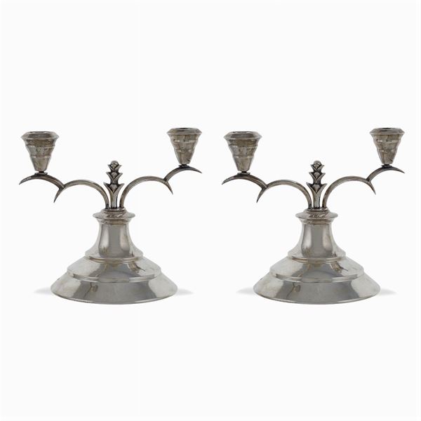 Pair of silver candelabra