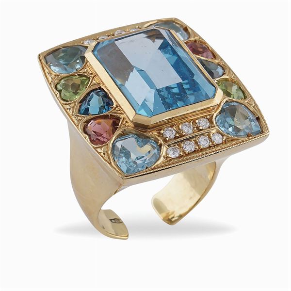 18kt gold blue topaz ring