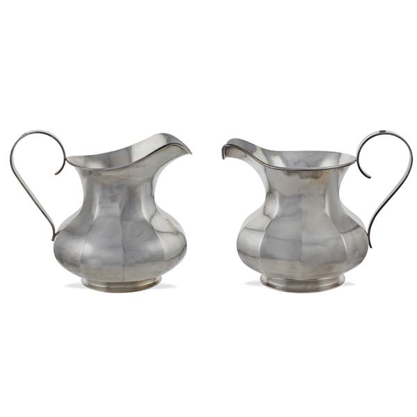 Two silver jugs