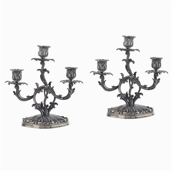 Pair of silver chandeliers