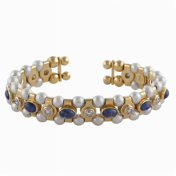 Bracciale a manetta in oro giallo 18kt