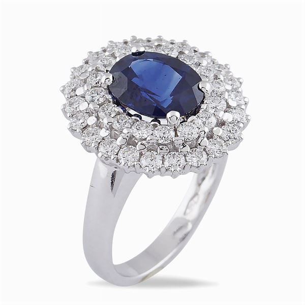 18kt white gold ring with sapphire