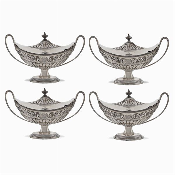 Four silver gravy boats