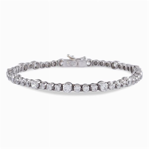 Bracciale tennis in oro bianco 18kt e diamanti