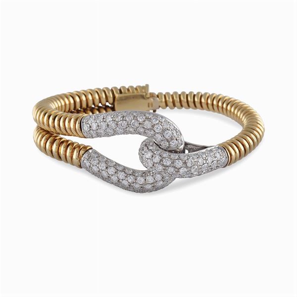 Bracciale a nodo in oro giallo e bianco 18kt