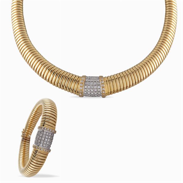 Parure in oro giallo e bianco 18kt e diamanti