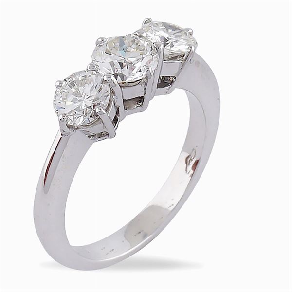 Anello trilogy in oro bianco 18kt e diamanti