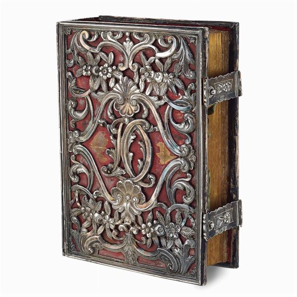 Antique vessal with silver foil cover