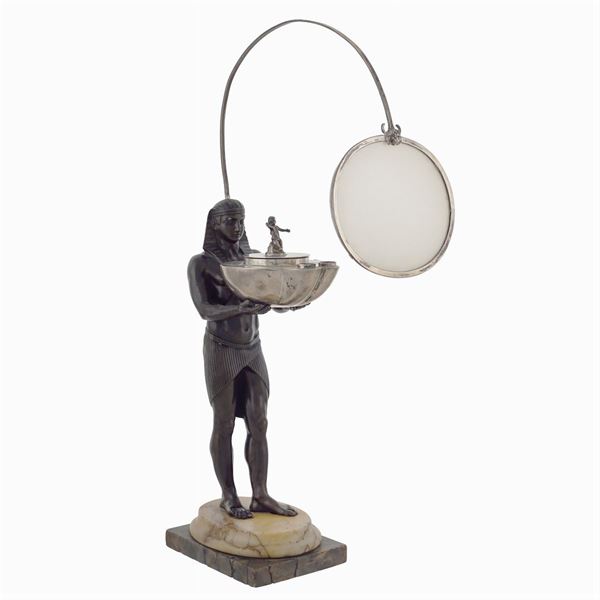 Burnished bronze and silver oil lamp
