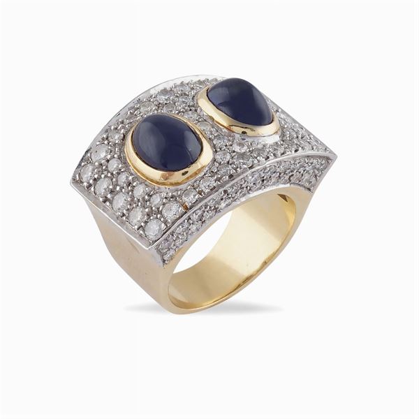 Anello a ponte in oro giallo e bianco 18kt