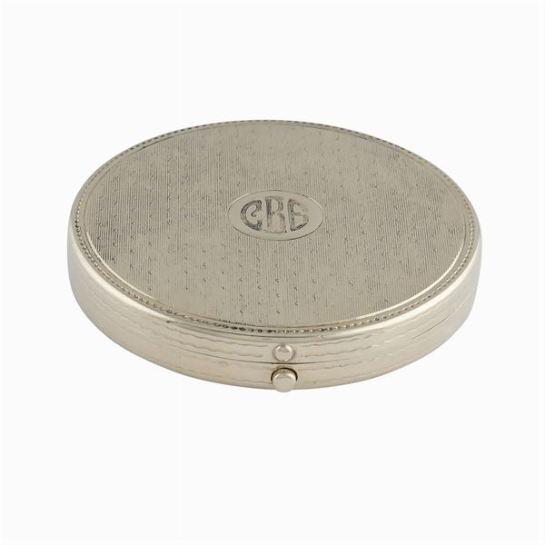 Yellow gold powder compact