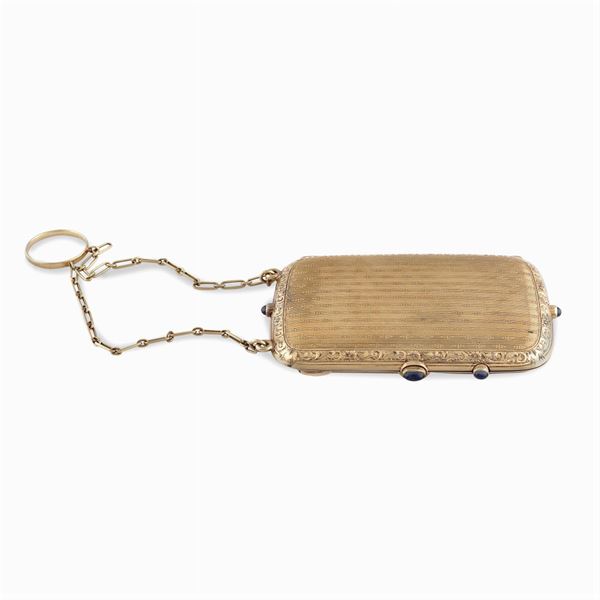 Trousse in oro giallo 14kt con catena ed anello