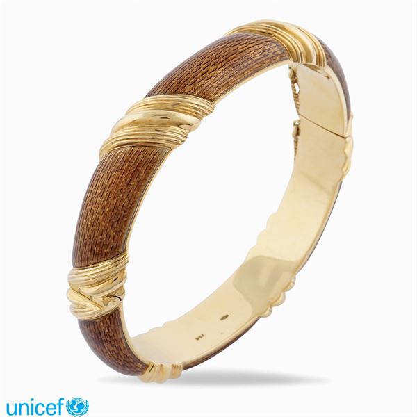 Bracciale a manetta in oro giallo 18kt
