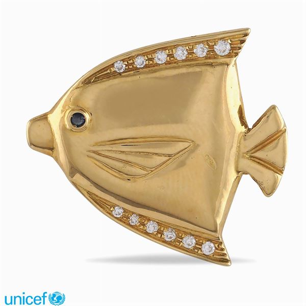 Spilla a pesce in oro giallo 18kt
