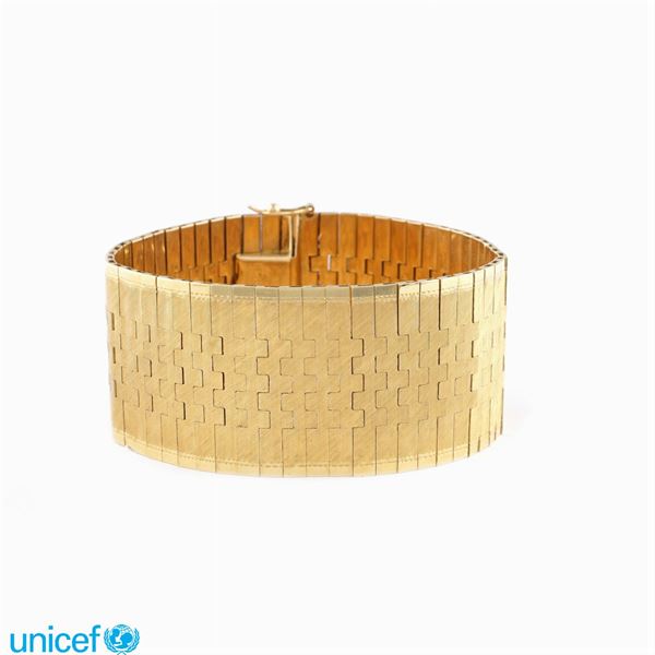 Bracciale a fascia alta in oro giallo 18kt