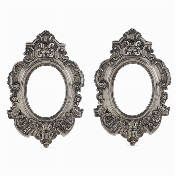 Pair of embossed silver frames