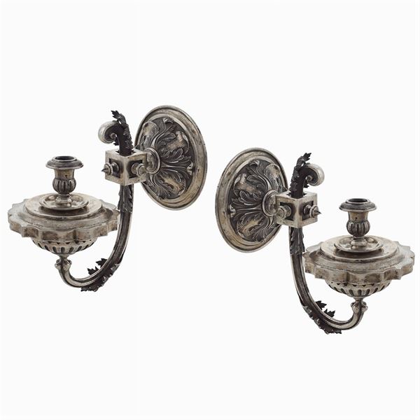 Pair of silver appliques