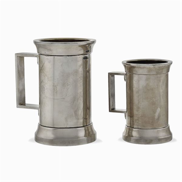 Coppia di mugs in argento e argento vermeil