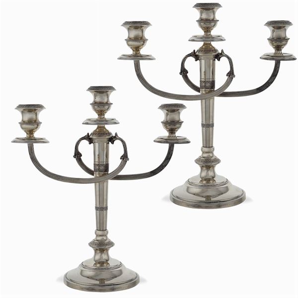Pair of silver chandeliers