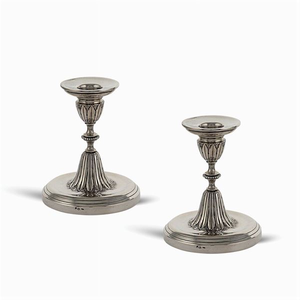 Coppia di candelieri in argento