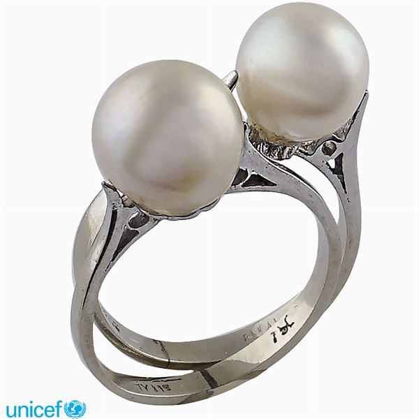 Two 18kt white gold with cultured pearls rings