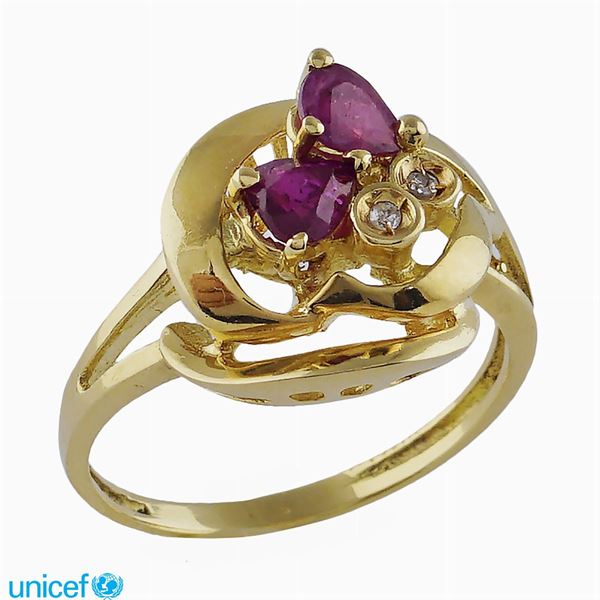 18kt gold ring with two rubies