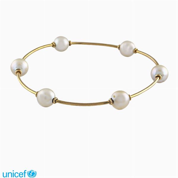 Bracciale a manetta in oro giallo 18kt