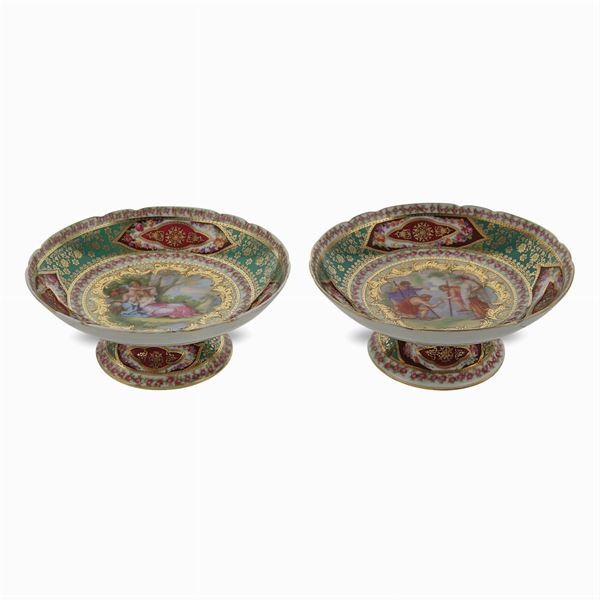 Pair of polychrome and partially golden porcelain stands