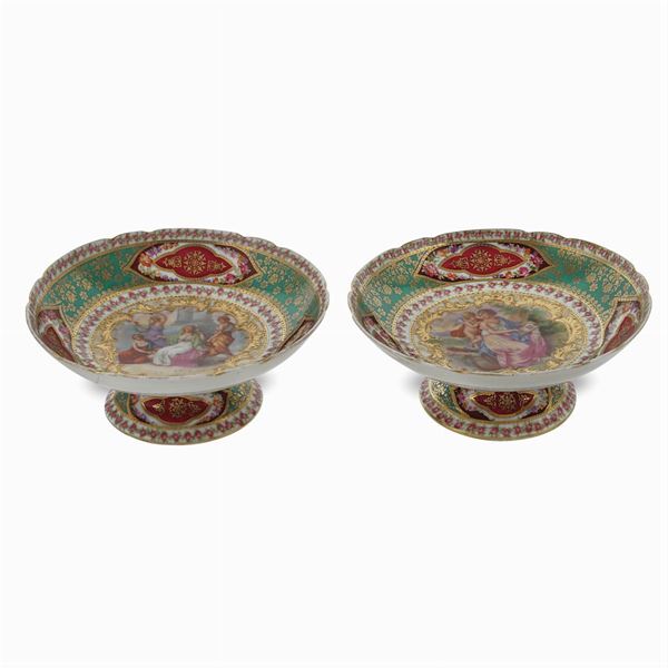 Pair of polychrome porcelain stands