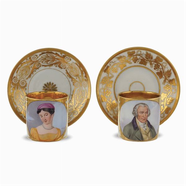Two polychrome porcelain cups with saucers