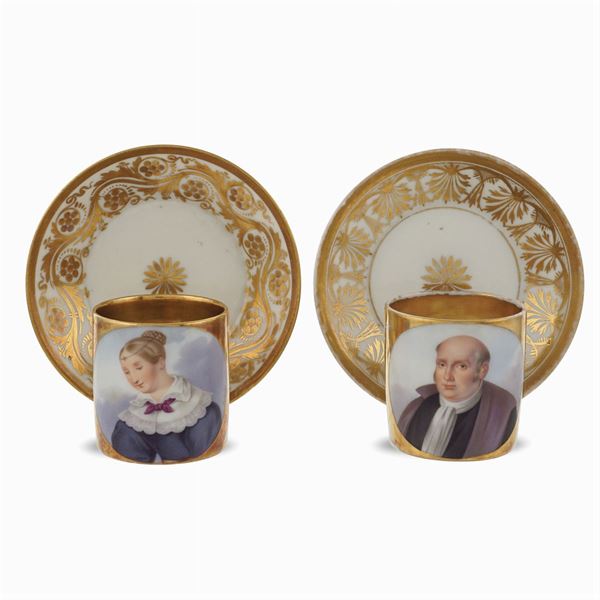 Two polychrome porcelain cups with saucers