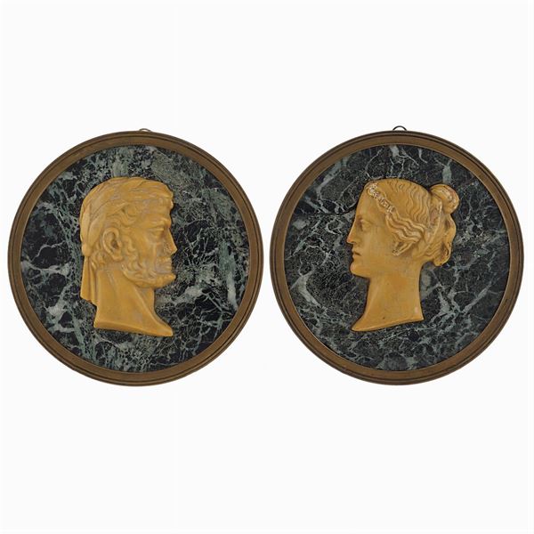Pair of circular marble plaques